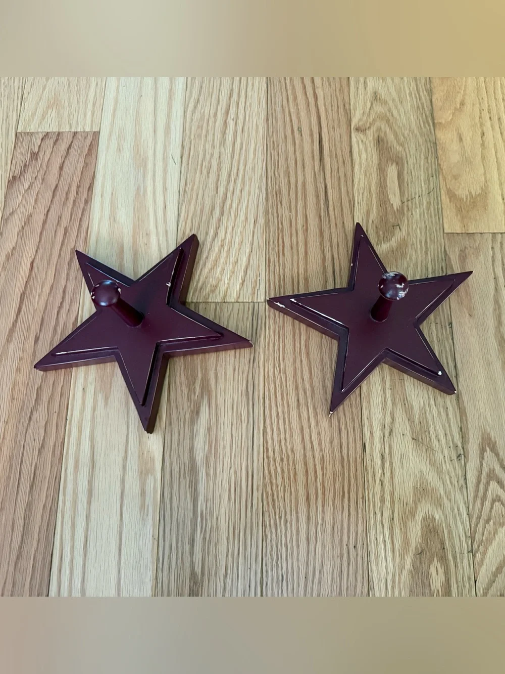 Pottery Barn distressed star shaped wall hooks maroon color 7”